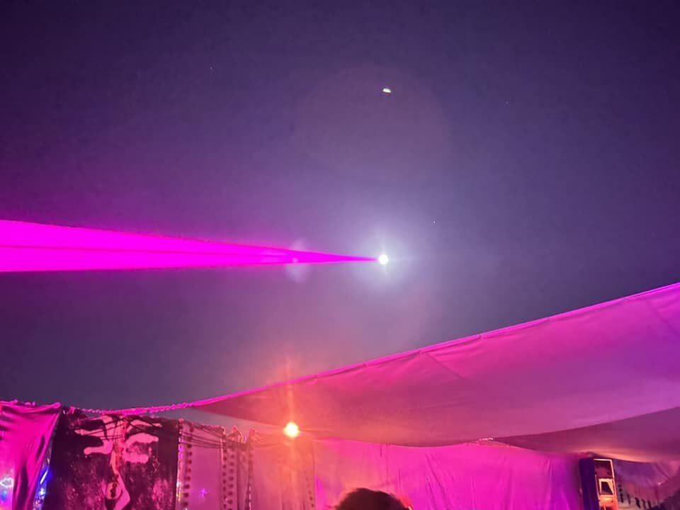 Just shooting the moon at Burning Man with our laser space cannons.