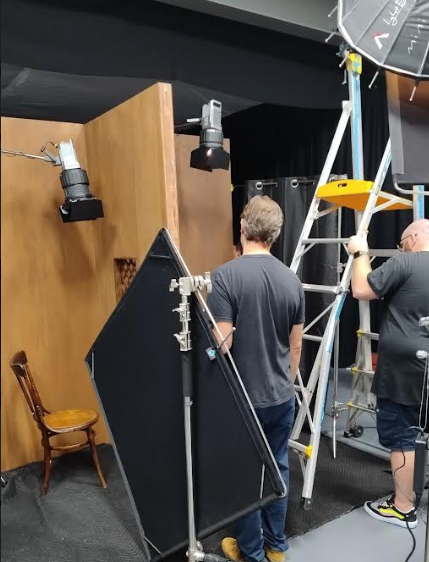 The workshop built a small set for a Short Movie, “The Confession”. Not surprisingly it is set inside a Confession booth as can be seen below in this snap taken in the studio during filming.