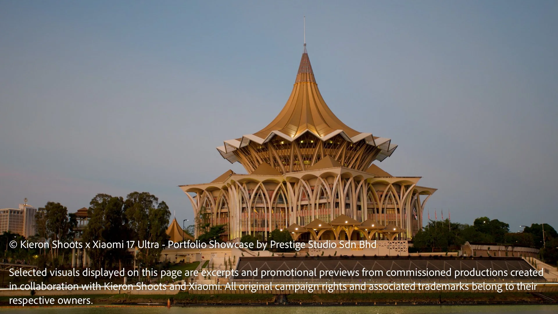 The Sarawak State Legislative Assembly building viewed from Kuching Waterfront during sunset.
