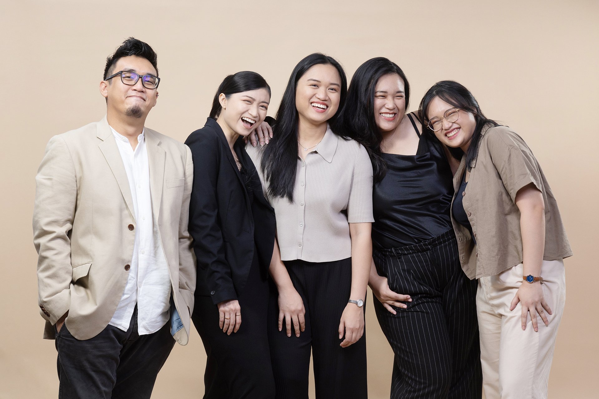 Friends posing together during a relaxed lifestyle group portrait session in Kuching Sarawak.