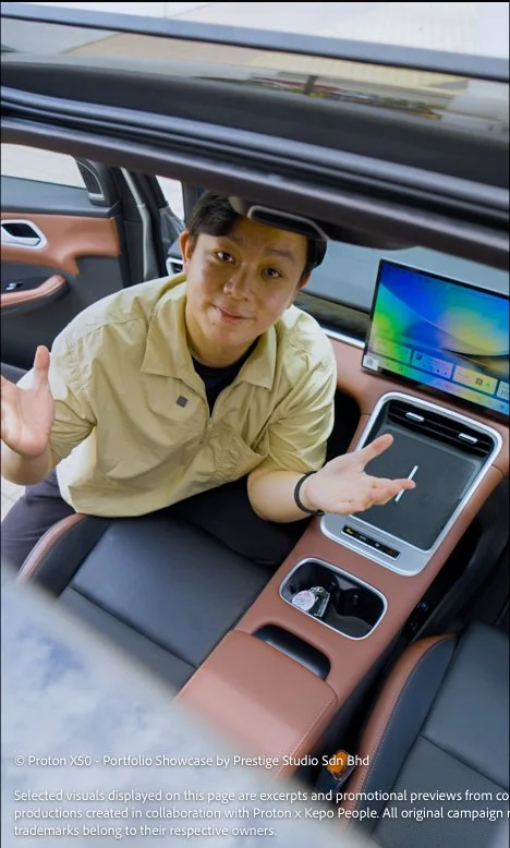 Talent sitting inside the Proton X50 cabin showcasing interior comfort and design