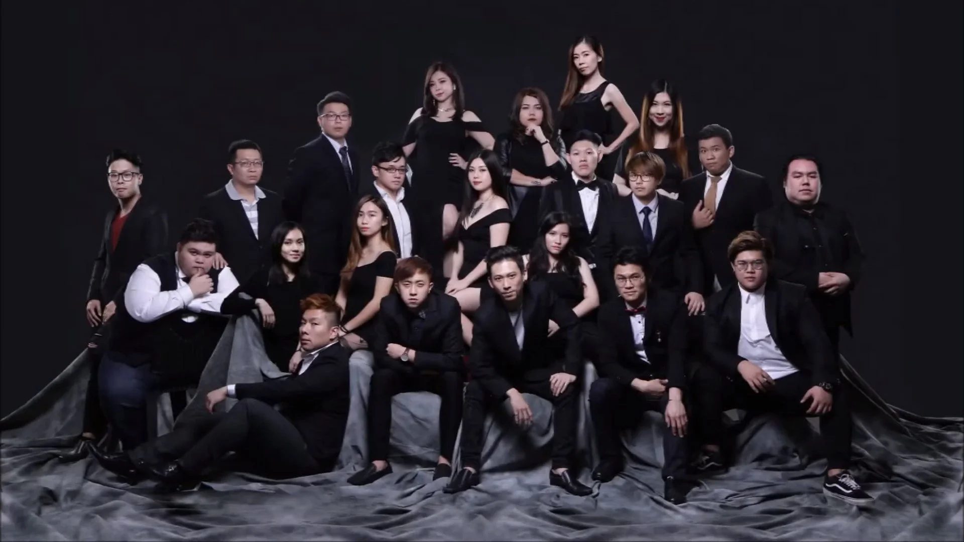 Professional corporate team portrait photographed in a studio by Prestige Studio in Kuching Sarawak.