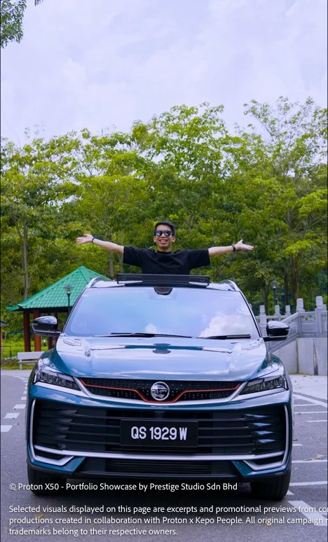 Talent standing through the Proton X50 sunroof during outdoor lifestyle shoot