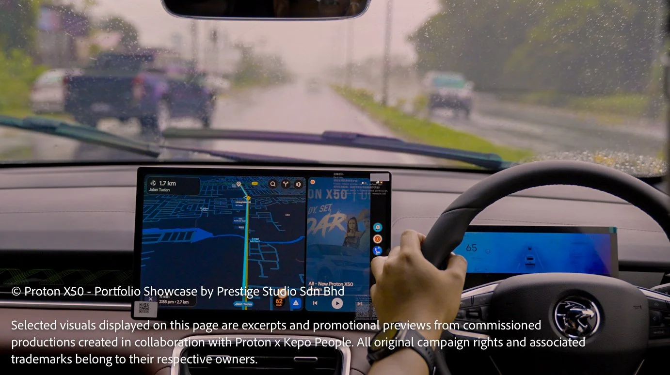 Proton X50 digital navigation and dashboard system during a rainy drive