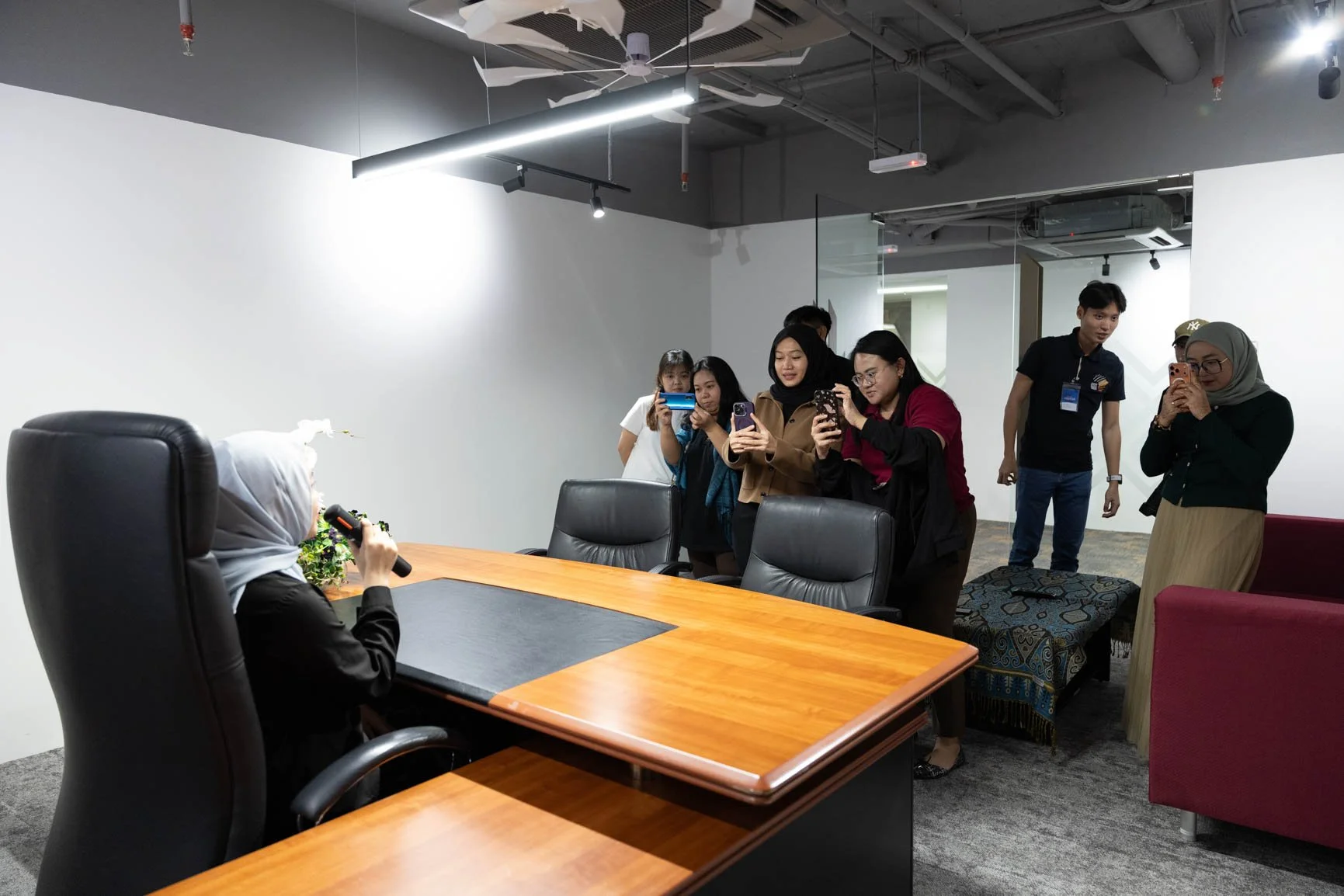 Participants practising smartphone photography together during an interactive corporate photography workshop.