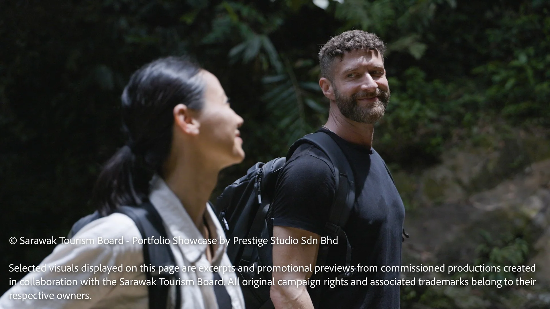 Tourists hiking through Sarawak rainforest trails during the Gateway to Borneo tourism commercial filmed by Prestige Studio Sdn Bhd.