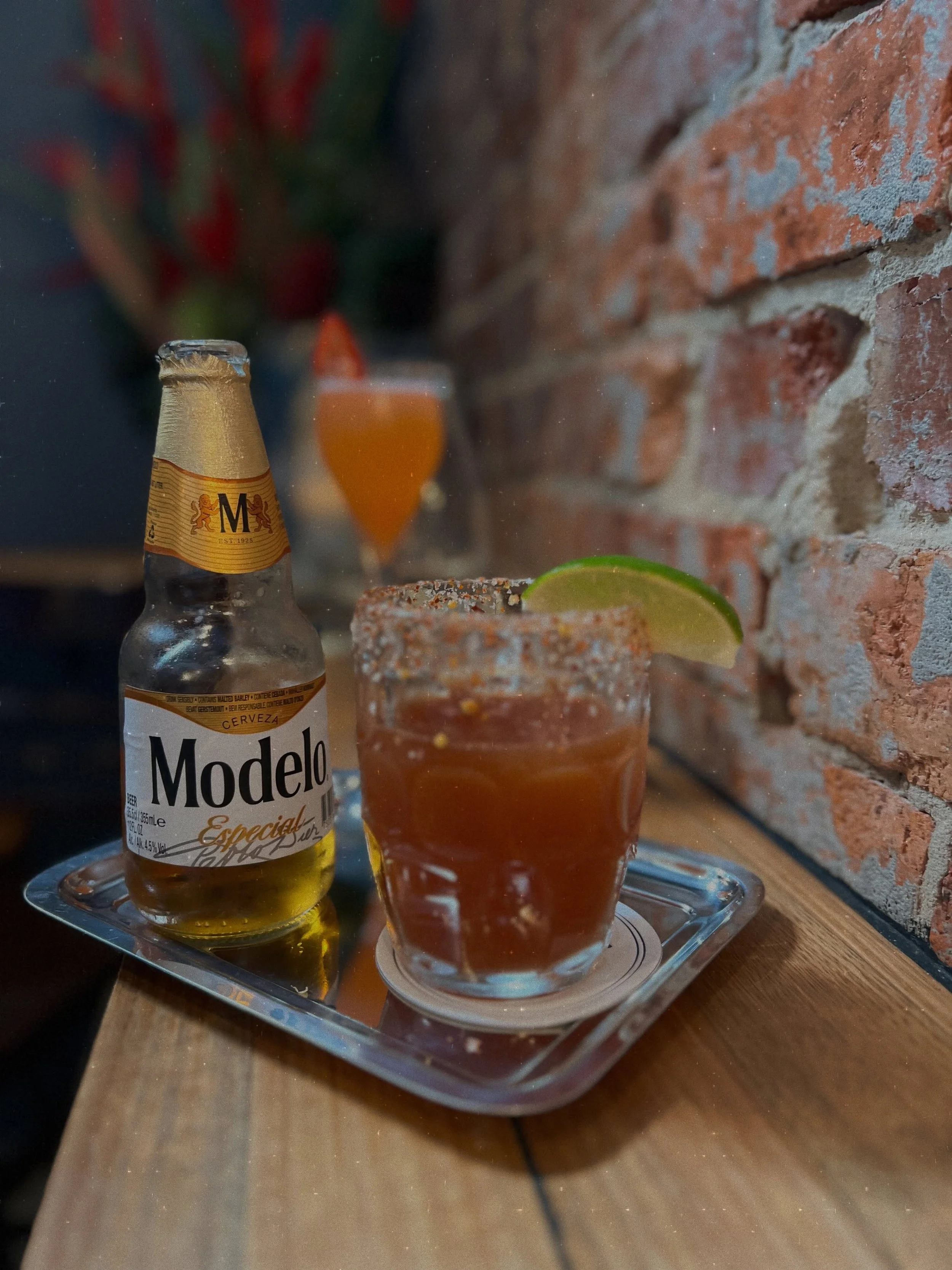 Hi, I&rsquo;m Michelada, pleased to meet you. 

tomato juice &bull; lime &bull; tabasco &bull; maggi &bull; worcestershire &bull; spicy salt rim &bull; topped with modelo mexican lager &bull; add a shot of montelobos mezcal if you&rsquo;re feeling ex