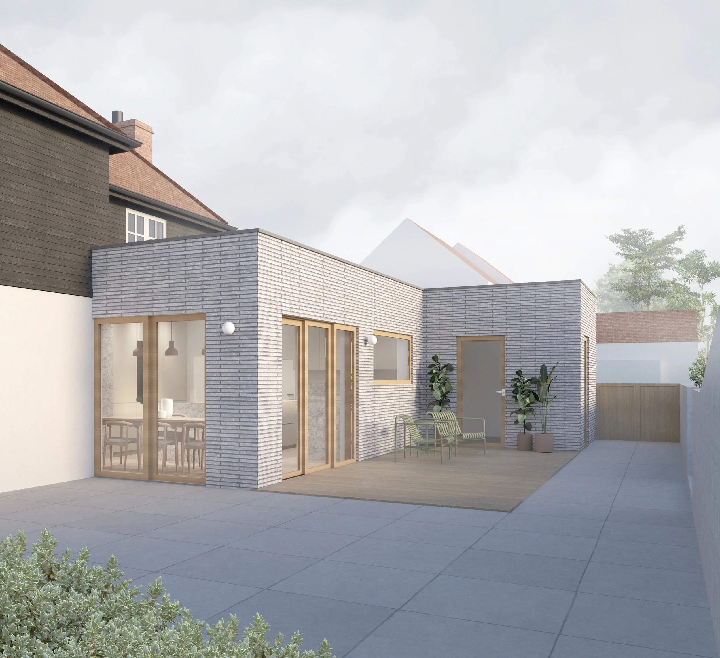 Angled visualisation of St Albans Garden House, showing the rear extension, original cottage and paving around a timber deck.