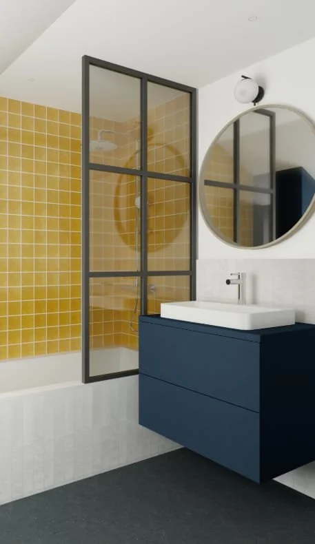 Bathroom detail visualisation at Lewisham House, with yellow tiles, a black-framed bath screen, a navy vanity and a round mirror.
