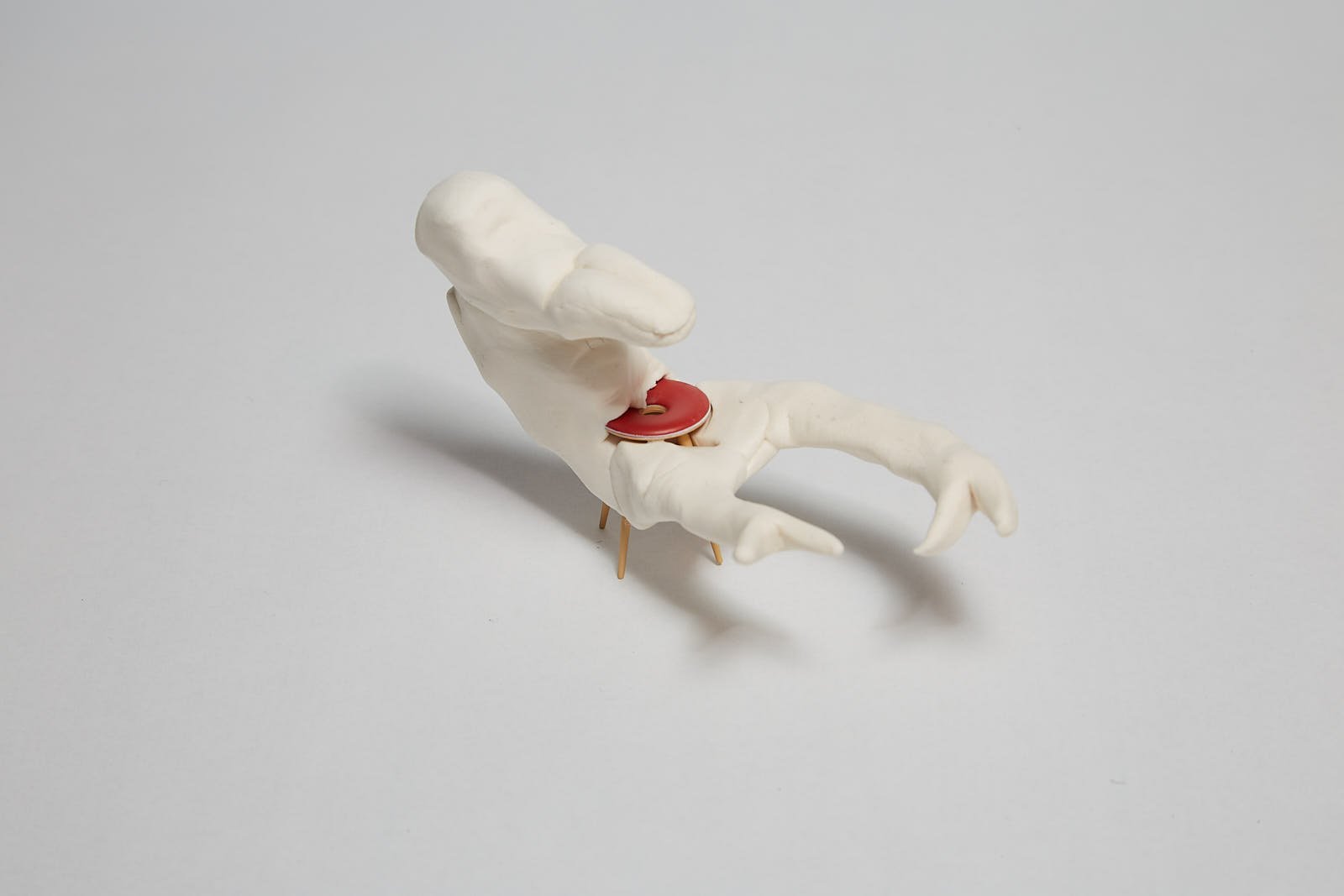 'Carpenter Apprentice' from "Under the weight of societal expectations" series, 2021. Soft polymer clay and dolls accessories - 11 x 7 x 6 cm