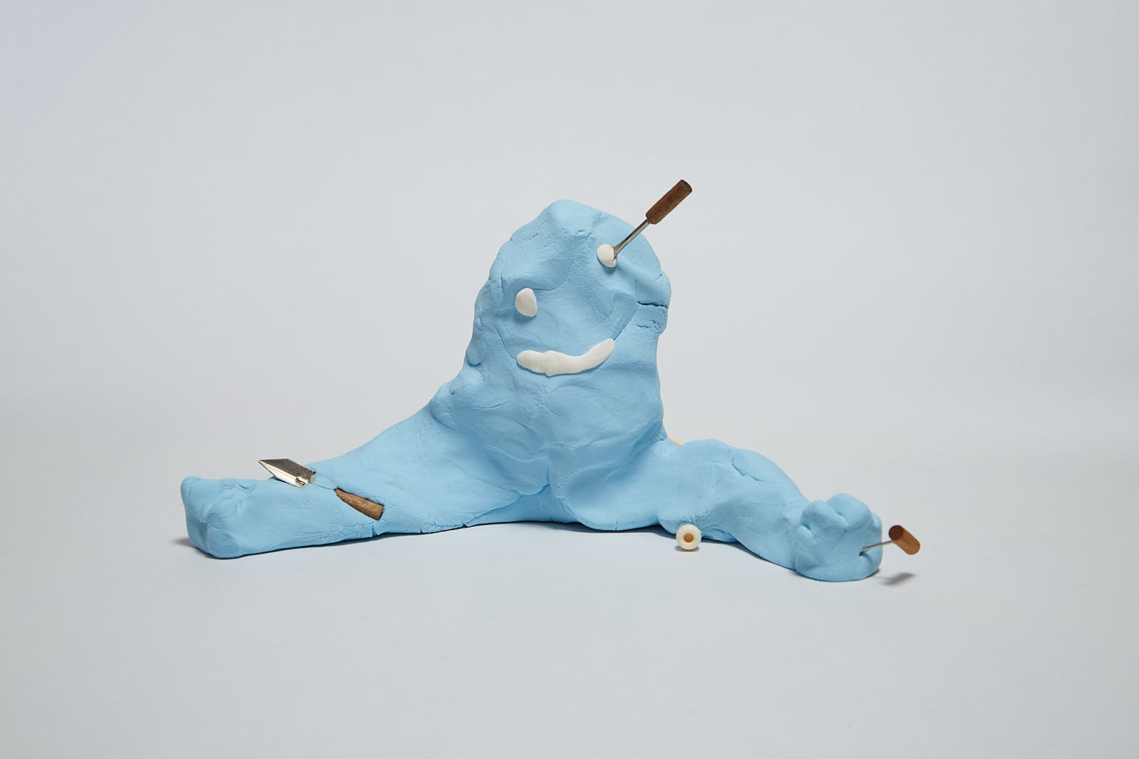 'Gardener' from "Under the weight of societal expectations" series, 2021. Soft polymer clay and dolls accessories - 23 x 15 x 10 cm