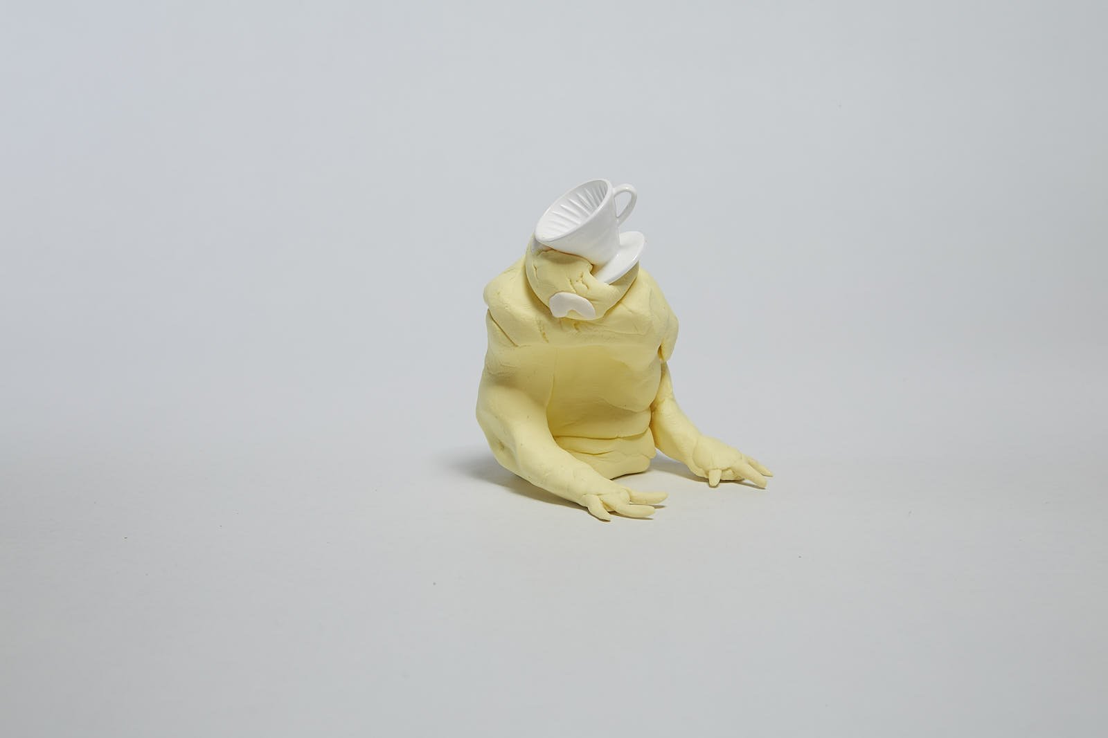 'Filter coffee lover' from "Under the weight of societal expectations" series, 2021. Soft polymer clay and dolls accessories - 7 x 7 x 9 cm