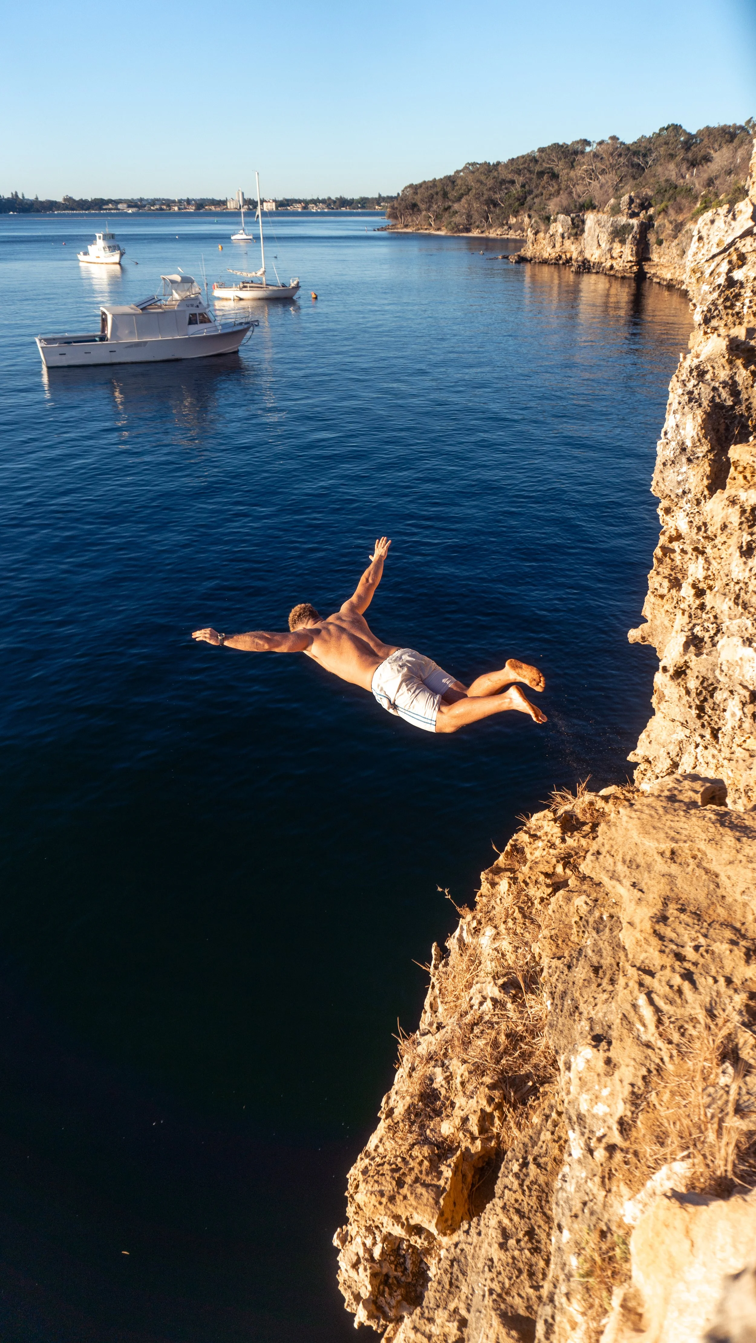 Cliff jumping with the guy they met yesterday-18.JPG