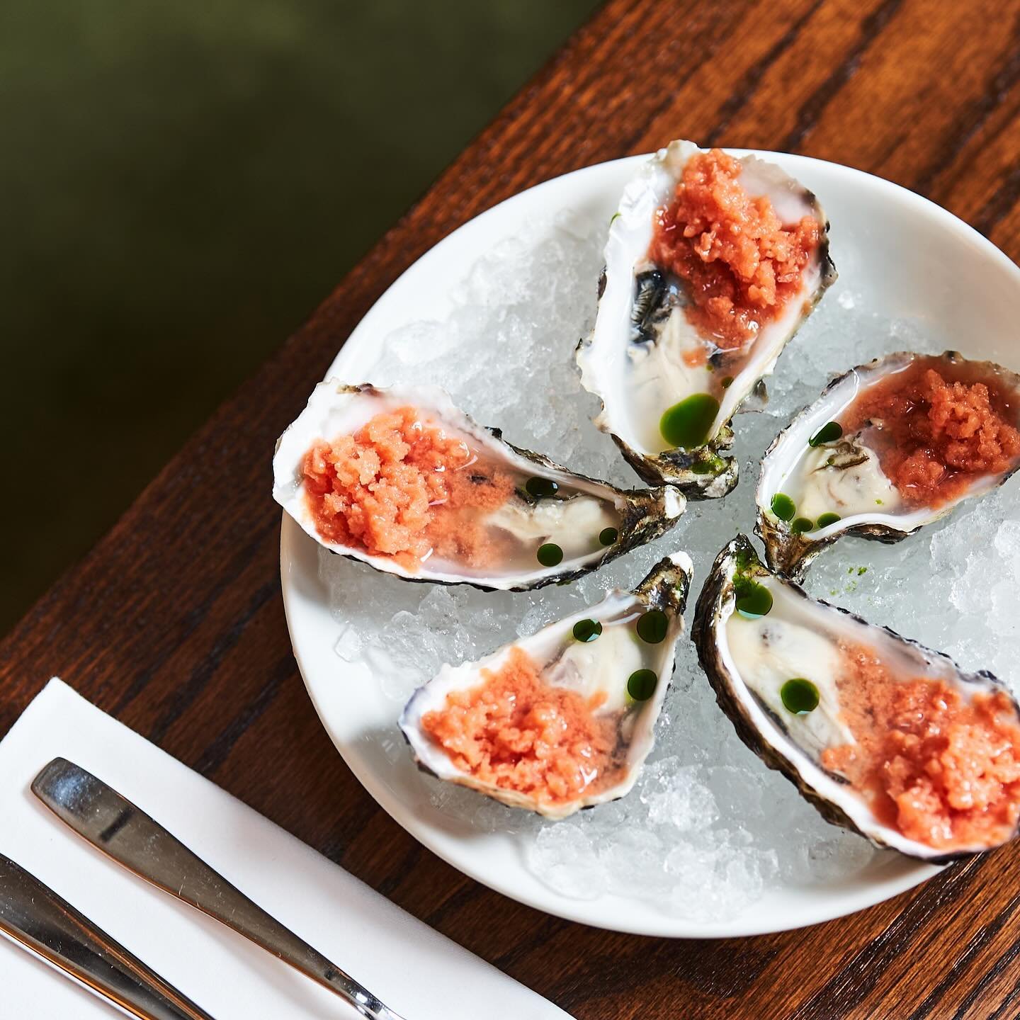 Carlingford Oysters with guava granita &amp; chives oil.