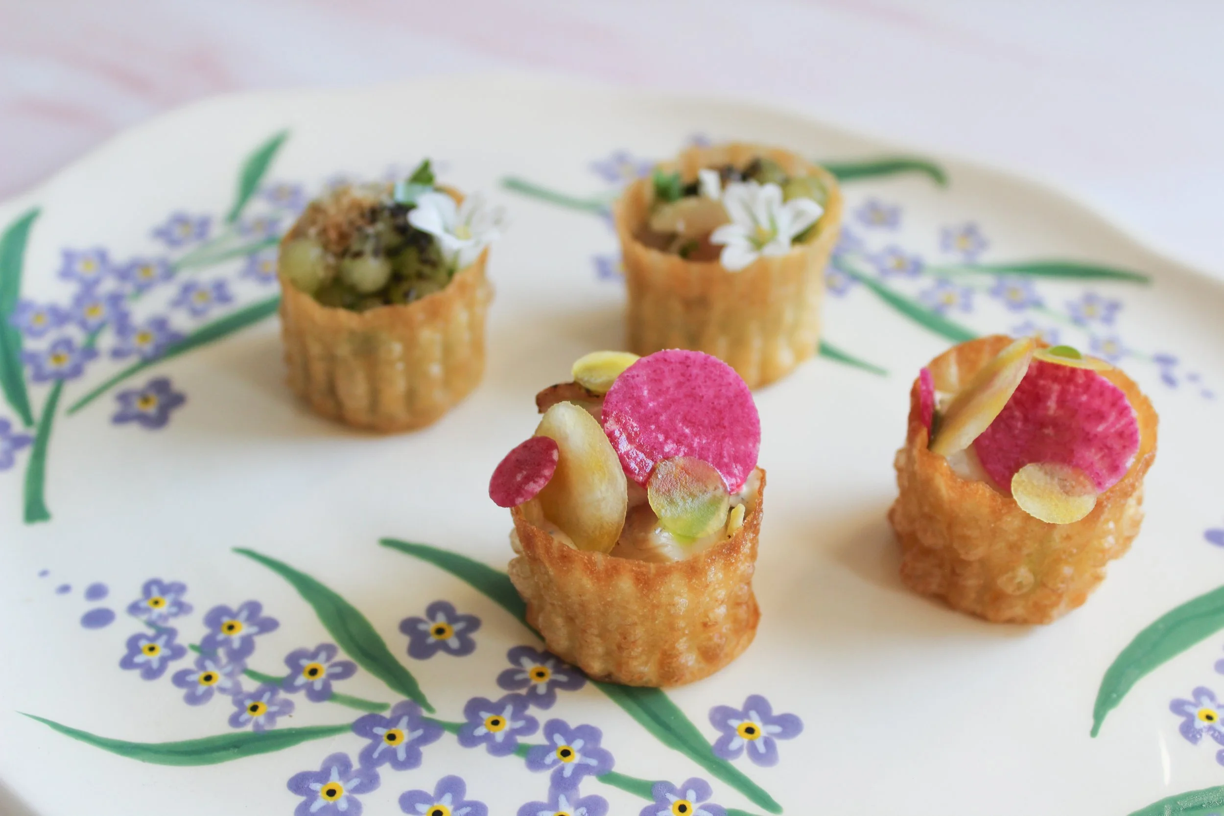 Croustade canapés, watermelon radish, three corner leek.jpg