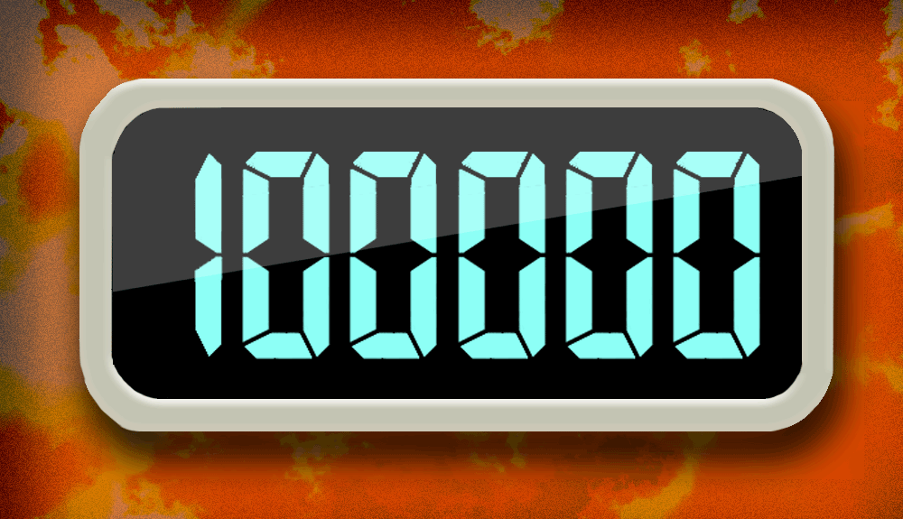 Digital clock displaying 12:08:40 against a background of autumn leaves.