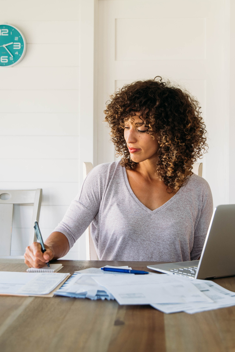 Woman working on her budget