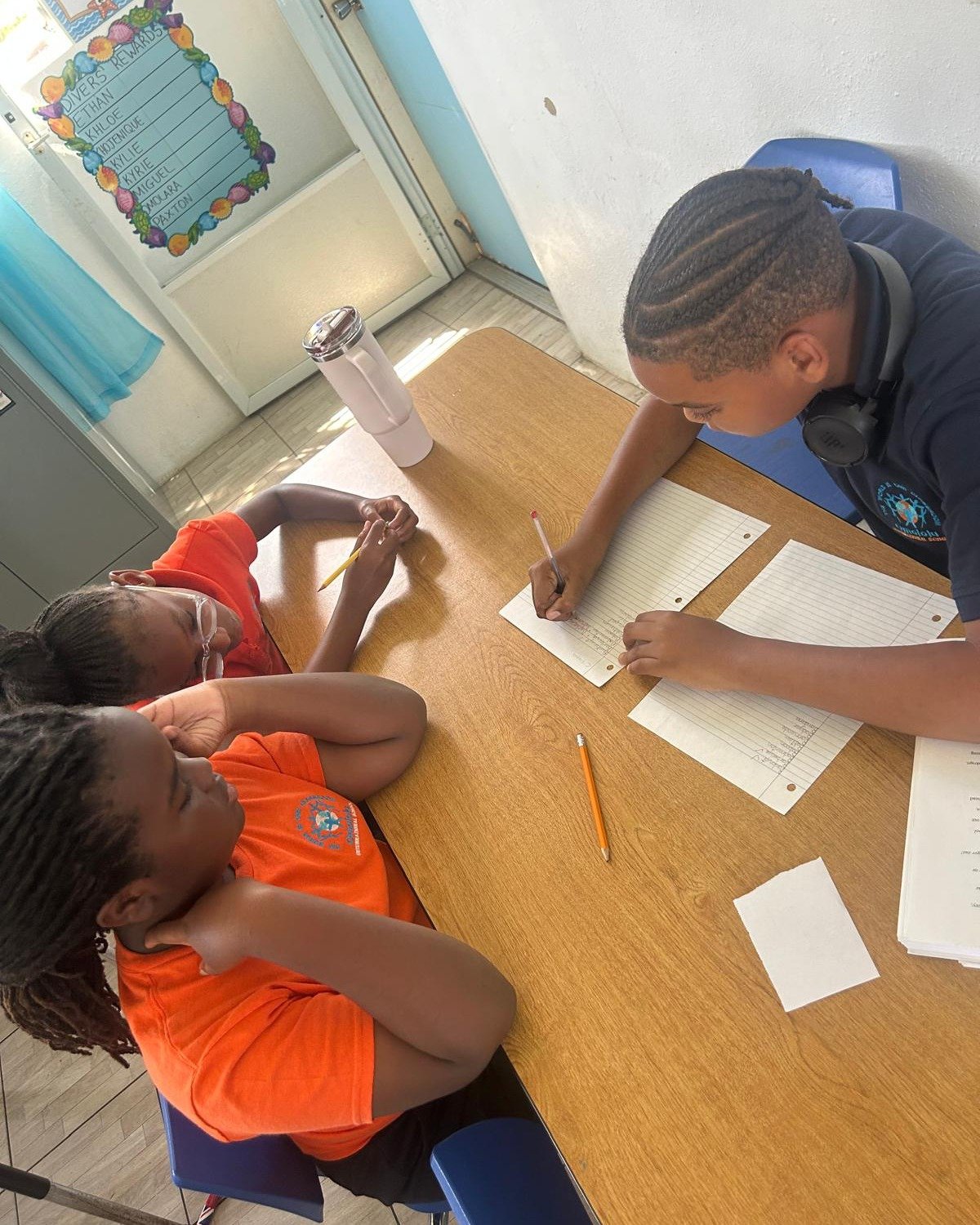 Peer learning shines at Omololu International School as older students support younger ones in preparing for the Rotary Club Spelling Bee. During these mentoring sessions, students work together to review word lists, practice pronunciation, and build