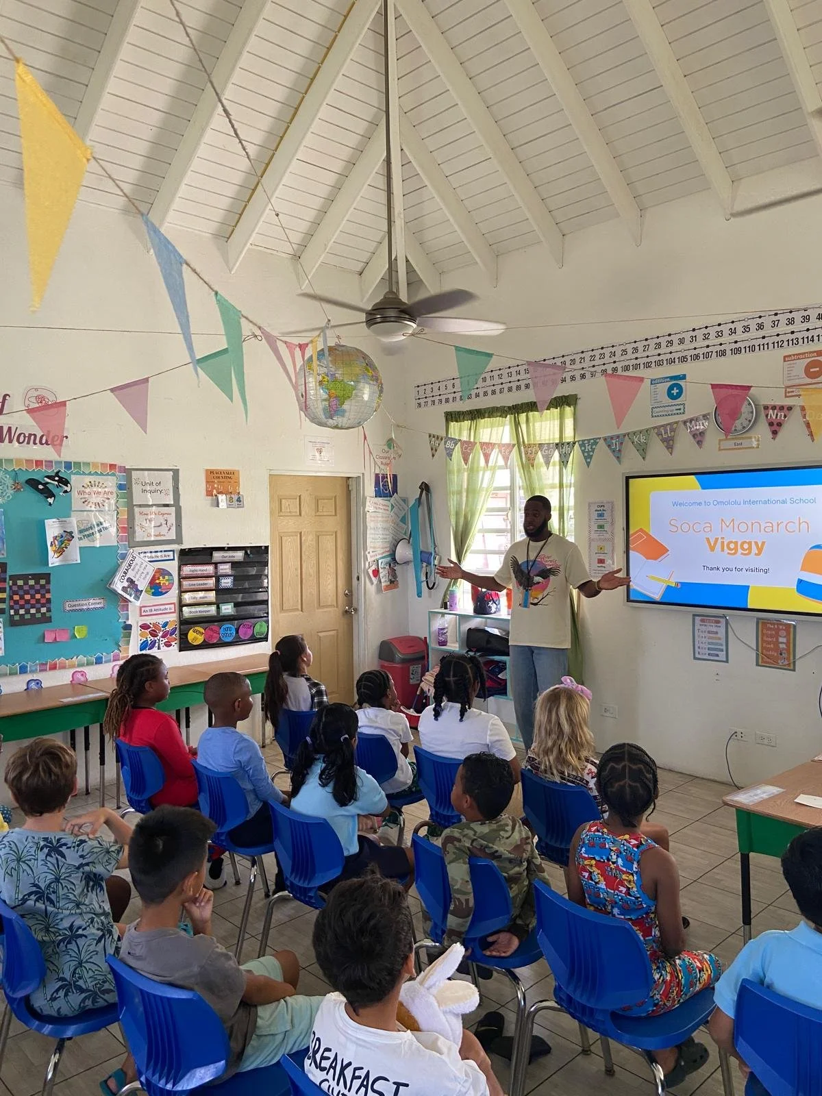 During Social Studies and Creative Arts, Omololu International School Grades 1, 2 and 3 students welcomed Anguillian Soca Monarch, Viggy, who shared how music serves as a powerful vehicle for culture. 

He spoke about what soca means to Anguilla and 