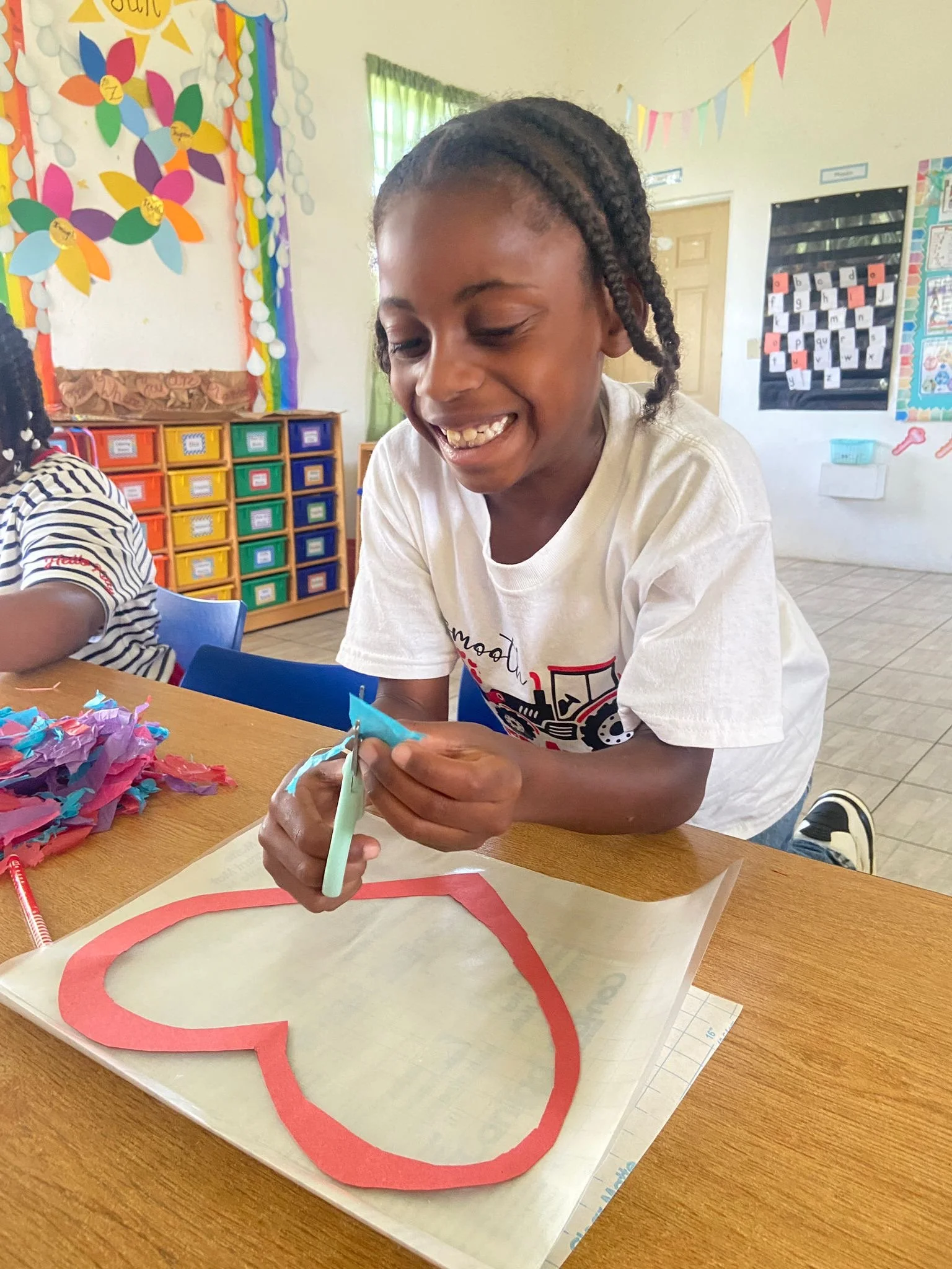 The Omololu International School Grade 2 students blended art and science by creating stained &ldquo;glass&rdquo; windows to explore light and transparency. As students layered colours and shapes, they watched how light passed through their designs t