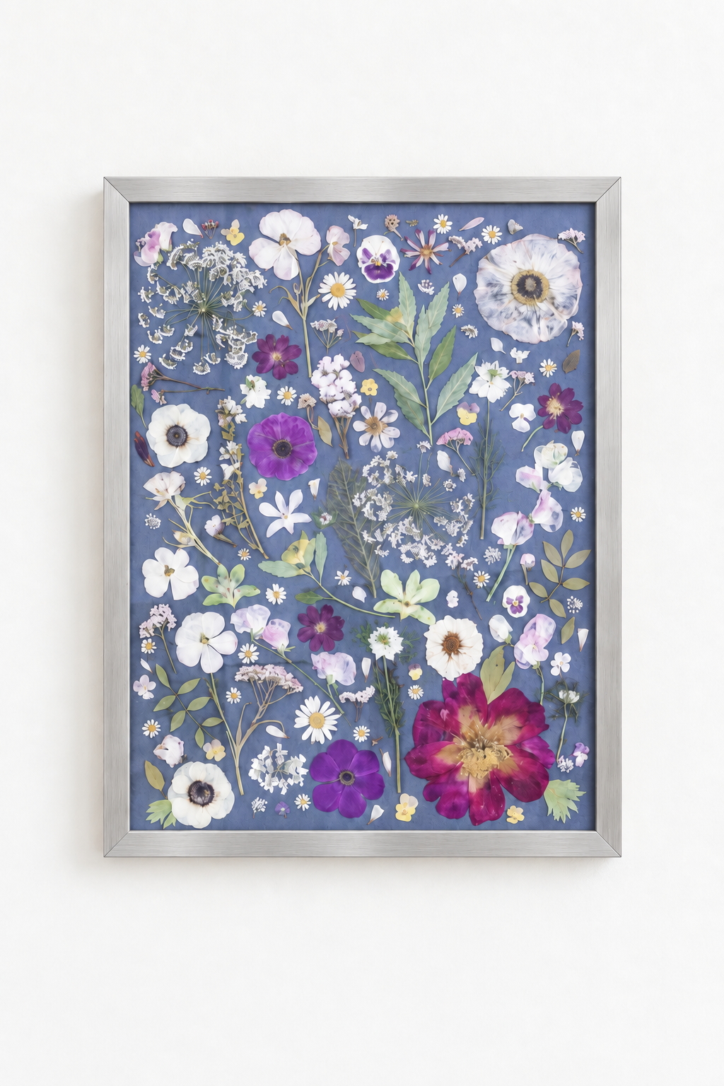 Blue floral art in satin silver frame.png