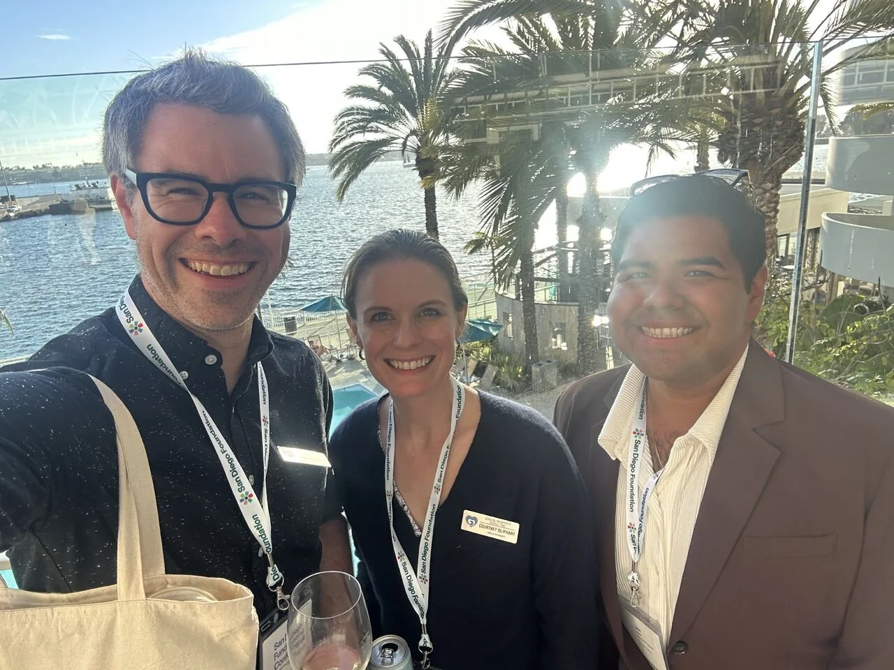 Doug and Courtney Oliphant with Jose Lopez of A Reason to Survive (ARTS) at the San Diego Foundation's Fundraising Conference