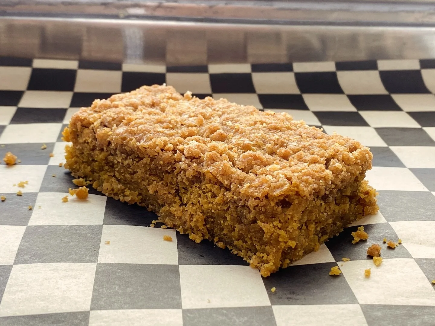 🎃Brown Butter Pumpkin Coffee Cake🎃 Our spiced pumpkin blondie topped with a buttery cinnamon brown sugar streusel. #pumpkin #coffeecake #blondie #sweets #bakery #foodie #vegas #foodtrailer