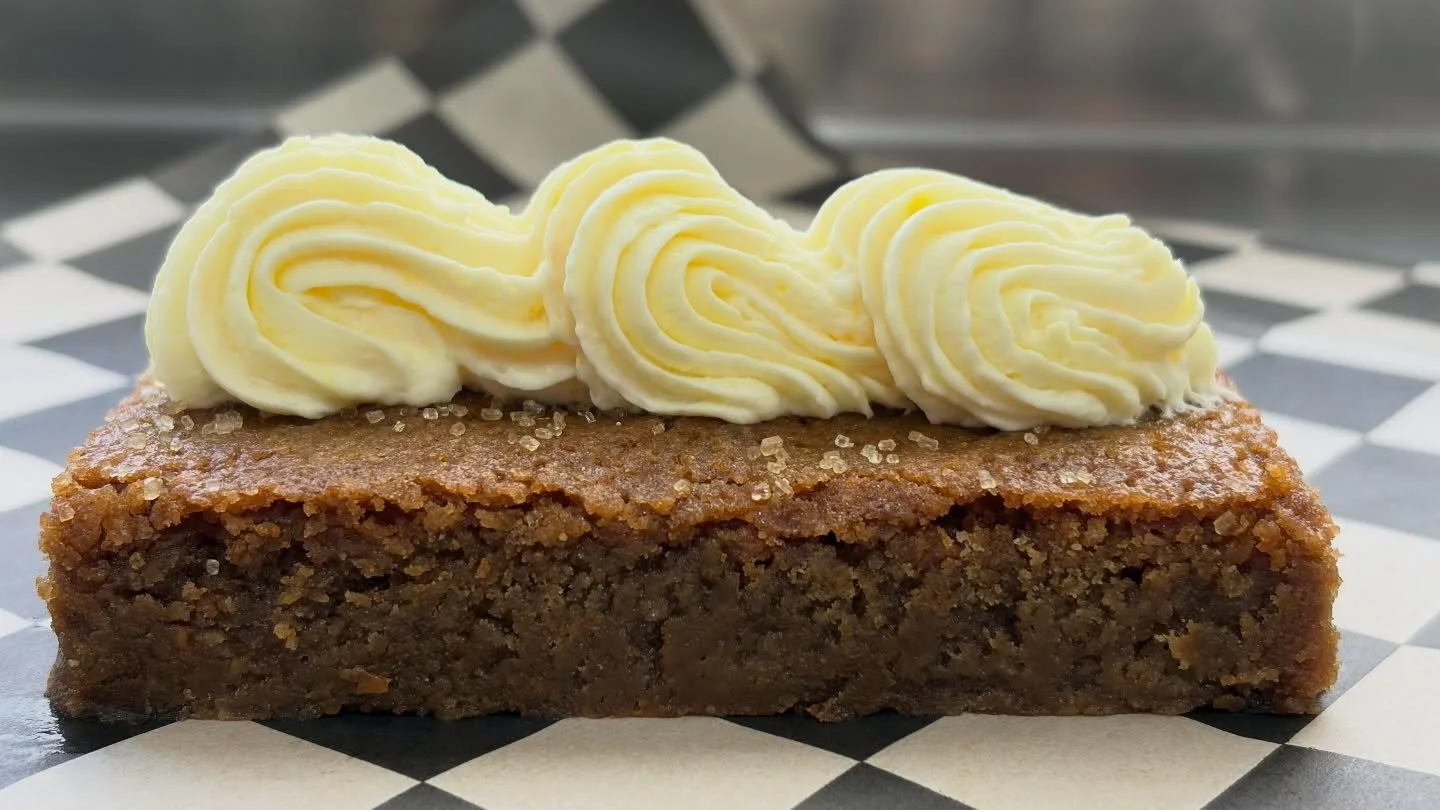 🍊Orange Ginger Blondie - Our warm ginger blondie with fresh orange rind, then topped with sweet vanilla whipped cream. 
#orange #orangeginger #blondie #vanilla #sweets #dessert #bakery #foodtrailer #foodie #vegas