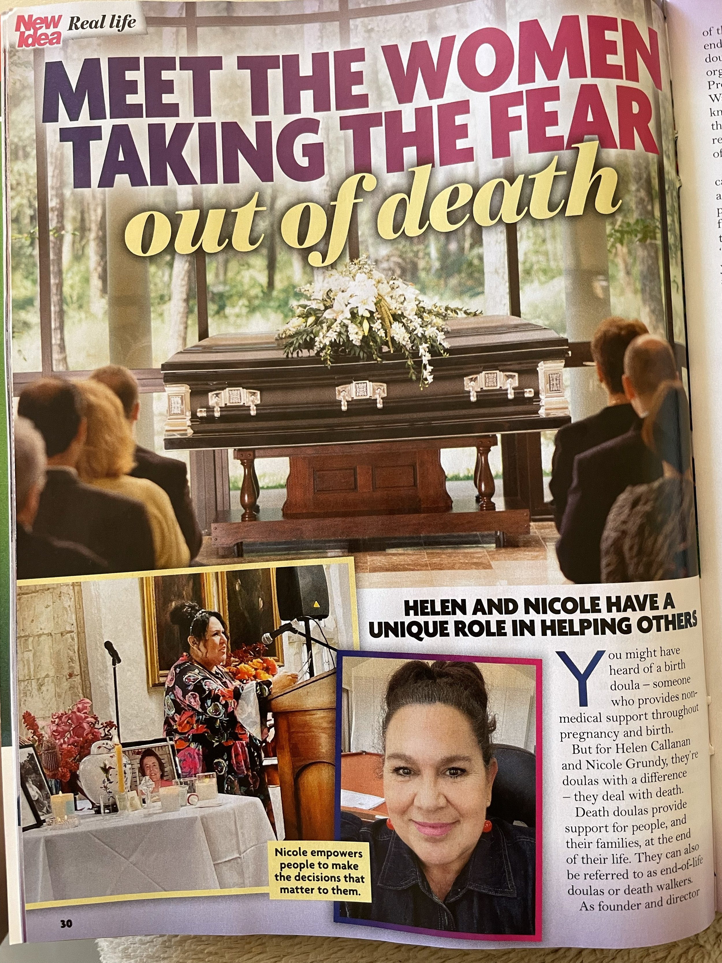 f a woman named Nicole Grundy speaking at a podium with framed photos and flowers on a table nearby. The headline reads, 'Meet the women taking the fear out of death' and a subheading states, 'Helen and Nicole have a unique role in helping others.'