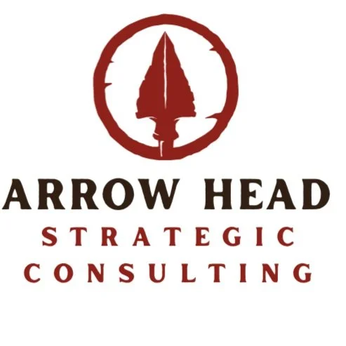 Logo for Arrow Head Strategic Consulting featuring a stylized arrowhead within a circle and the company name below.