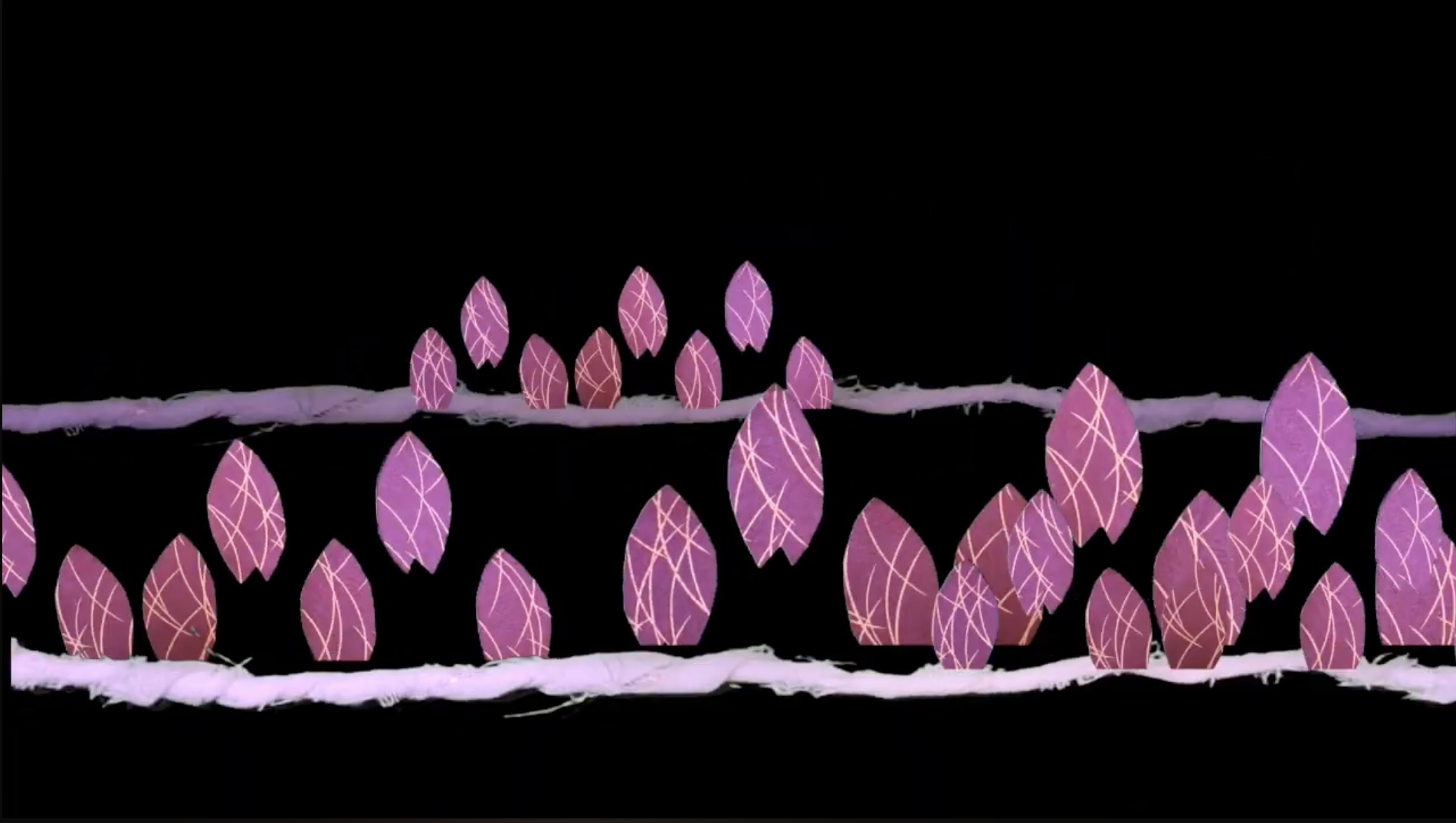 Decorative pink and purple leaves on white strings against a black background.