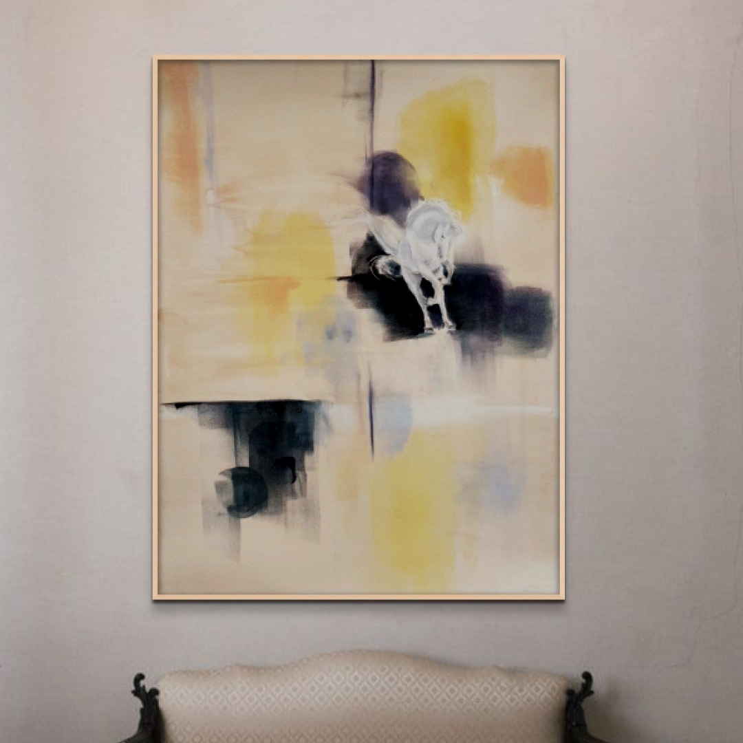 Abstract painting of a horse with gray, black, yellow, and orange colors, hanging on a beige wall above a patterned cream-colored sofa.