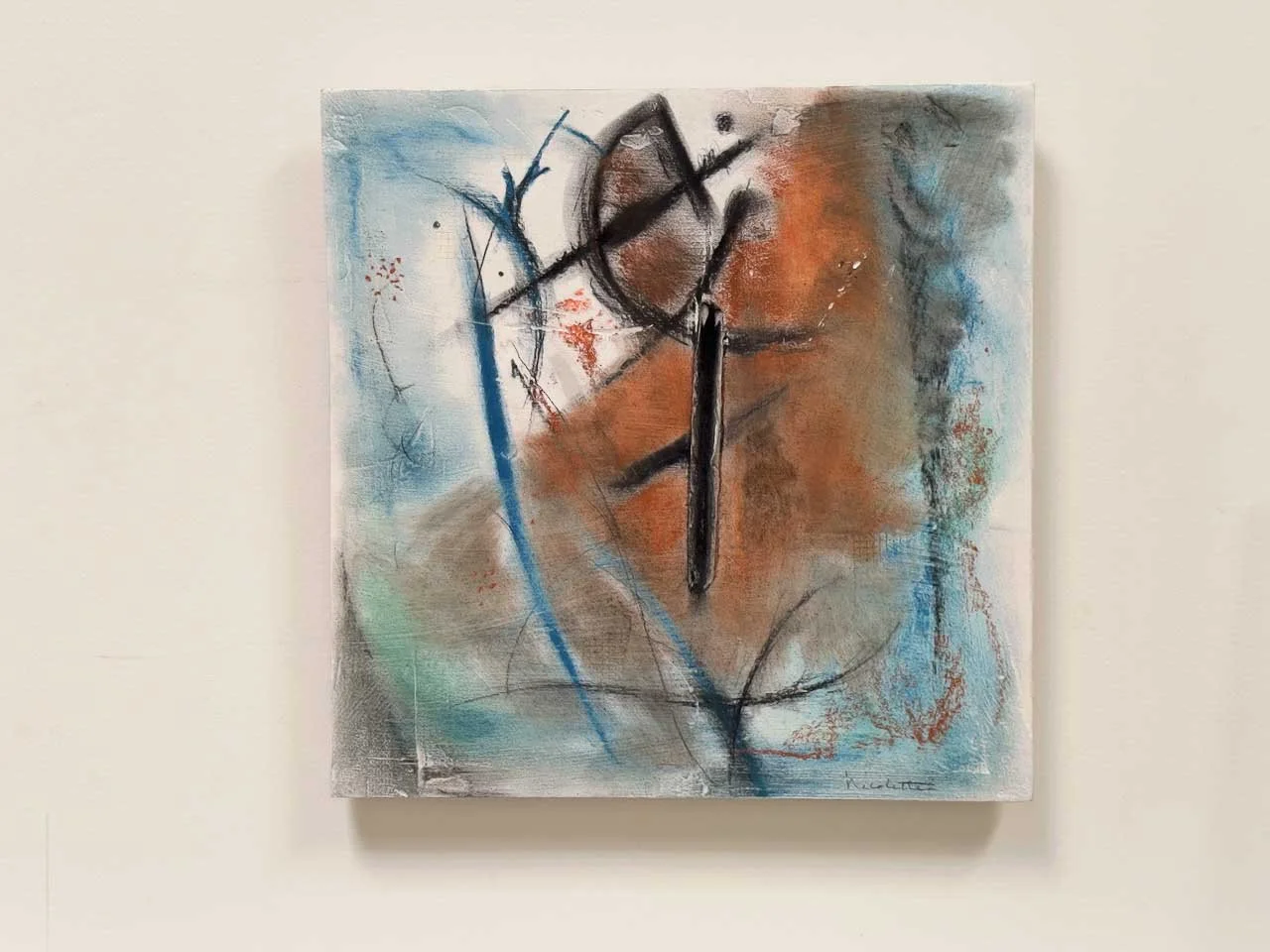 Abstract painting with bold black lines and swirls, featuring a mix of brown, blue, and white colors on canvas.