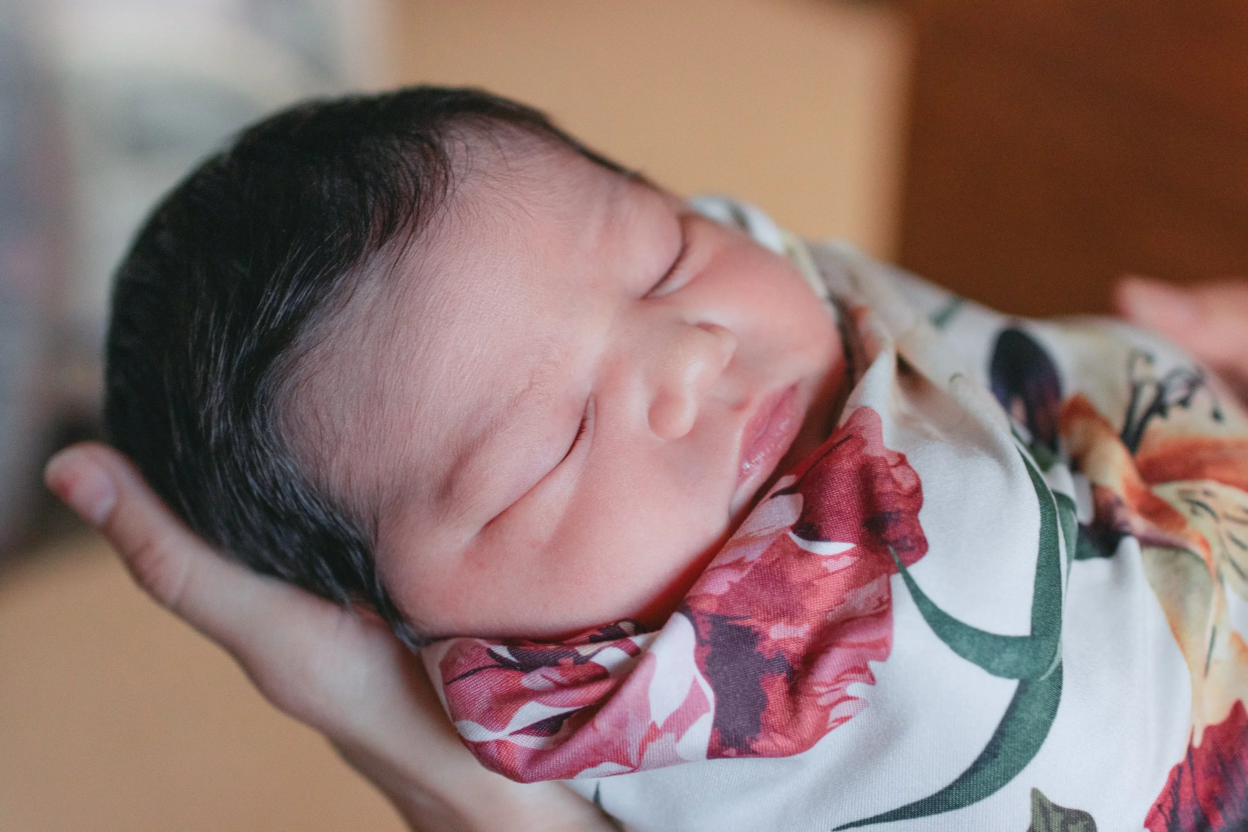 Newborn baby during Fresh 48 hospital photography session.