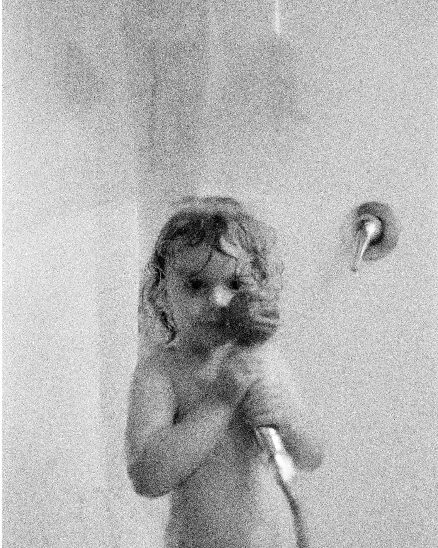 His blonde wet curls stuck to his head, curious eyes looking out at me, grabbing the shower head and trying to spray me through the shower glass &mdash; details that are simple and so sweet. 
⠀⠀⠀⠀⠀⠀⠀⠀⠀
Niko enjoying some rare third child alone time, 