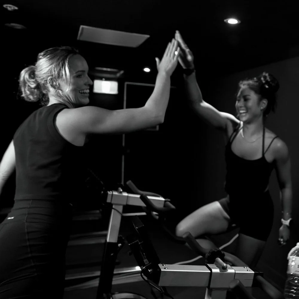 TESTING WEEK: two members high-fiving
