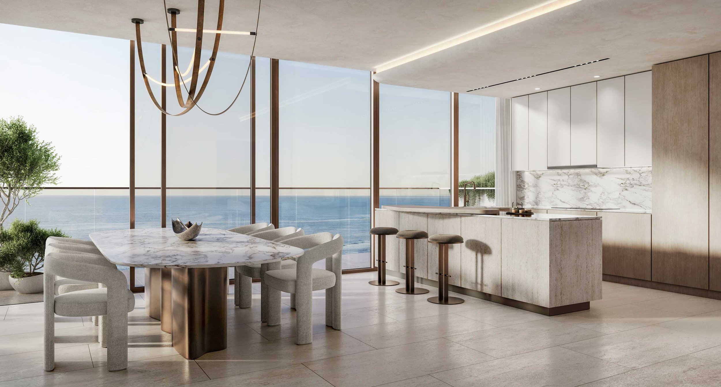 Modern kitchen and dining area with ocean view, white marble table, light-colored chairs, bar stools, and minimalist cabinetry.  Beyond Properties. Dubai Real Estate Marketing.
