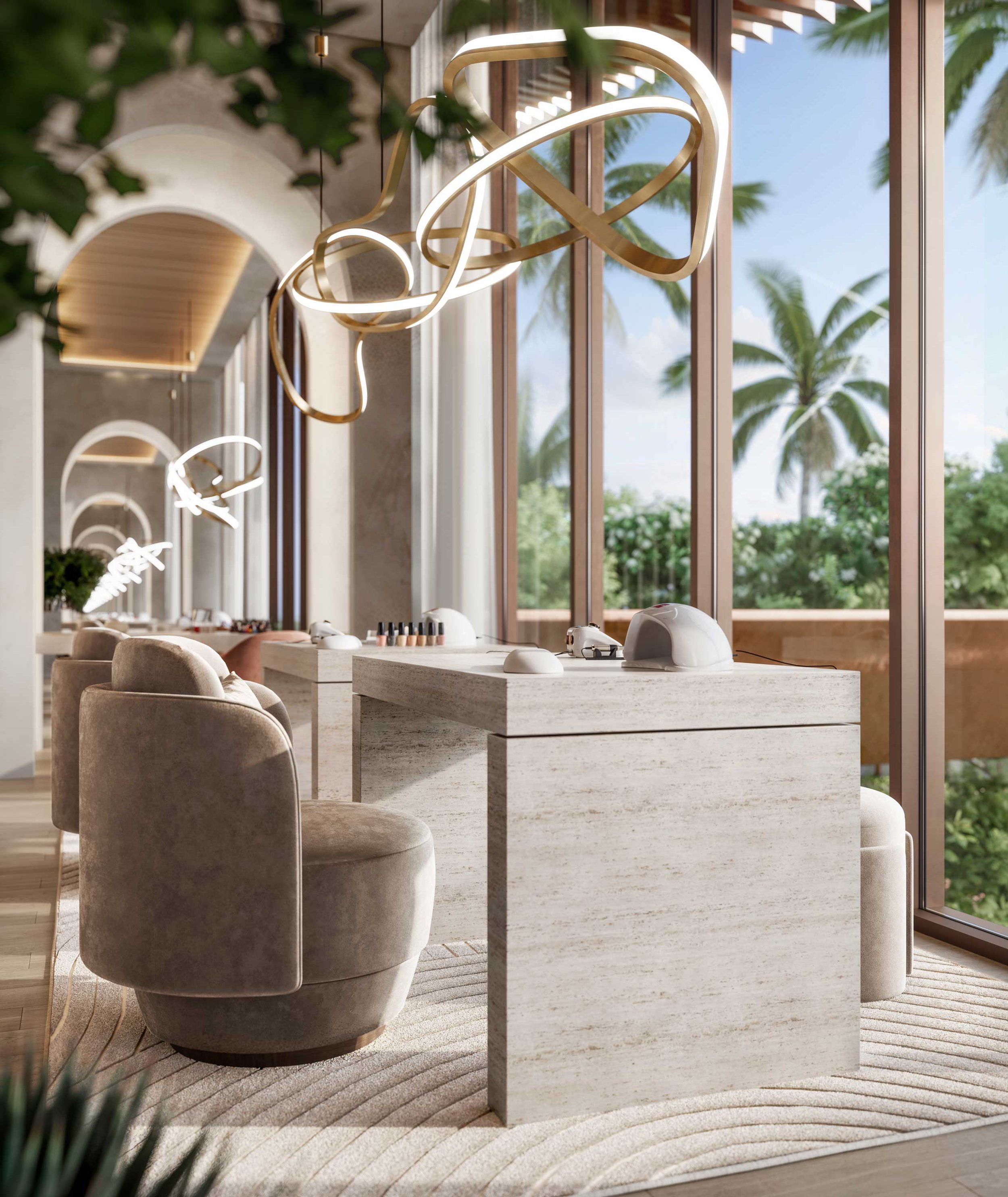 Interior of a modern, elegant nail salon with large windows overlooking lush greenery and palm trees, featuring contemporary beige chairs and white marble manicure tables.  Beyond Properties. Dubai Real Estate Marketing.