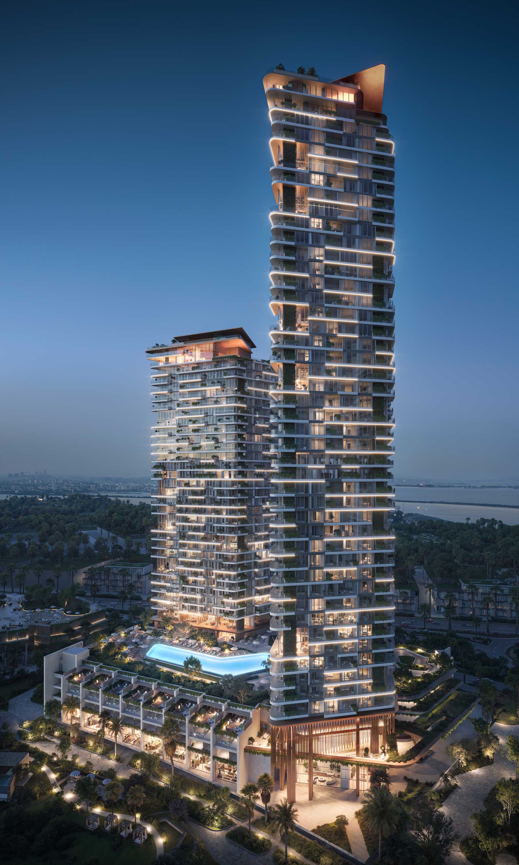   Beyond Properties. Dubai Real Estate Marketing.Night view of a modern high-rise residential building with unique curved architecture and illuminated balcony lines, surrounded by a well-lit landscaped area.