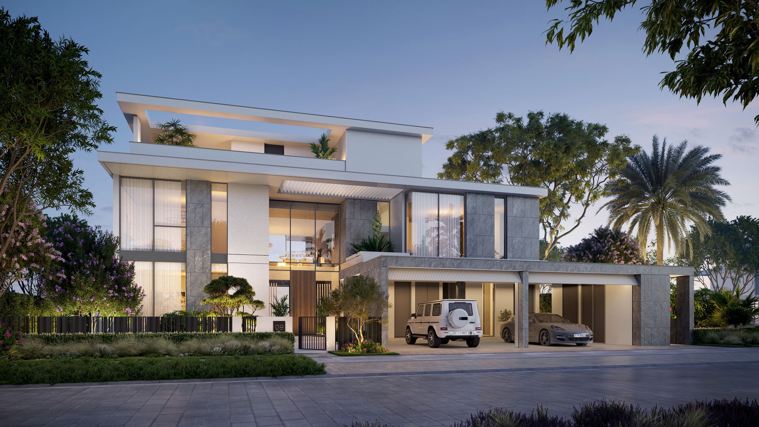 Modern multi-story house with large glass windows, landscaped front yard with trees and bushes, two garage spaces with cars parked, and a gated entrance, surrounded by greenery and trees at dusk. Palm Jebel Ali. Dubai Real estate marketing.