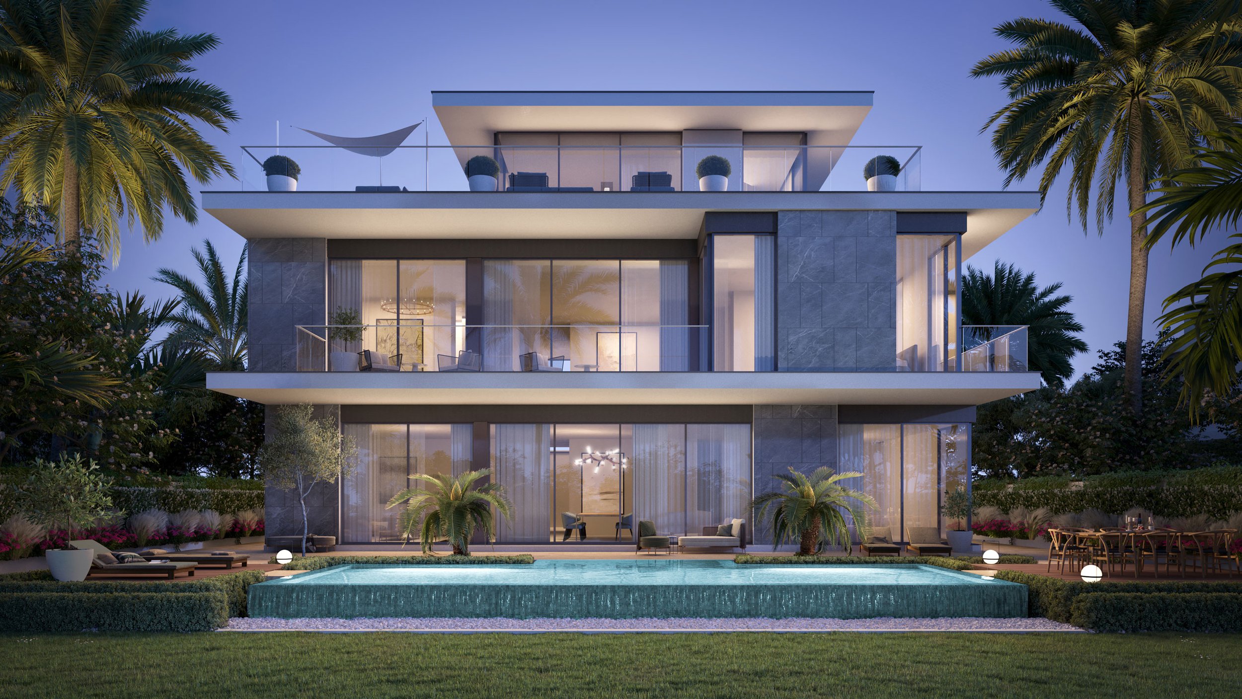 Modern three-story house with large glass windows and balconies, surrounded by palm trees, with a backyard pool and outdoor seating area at dusk. Palm Jebel Ali. Dubai Real estate marketing.