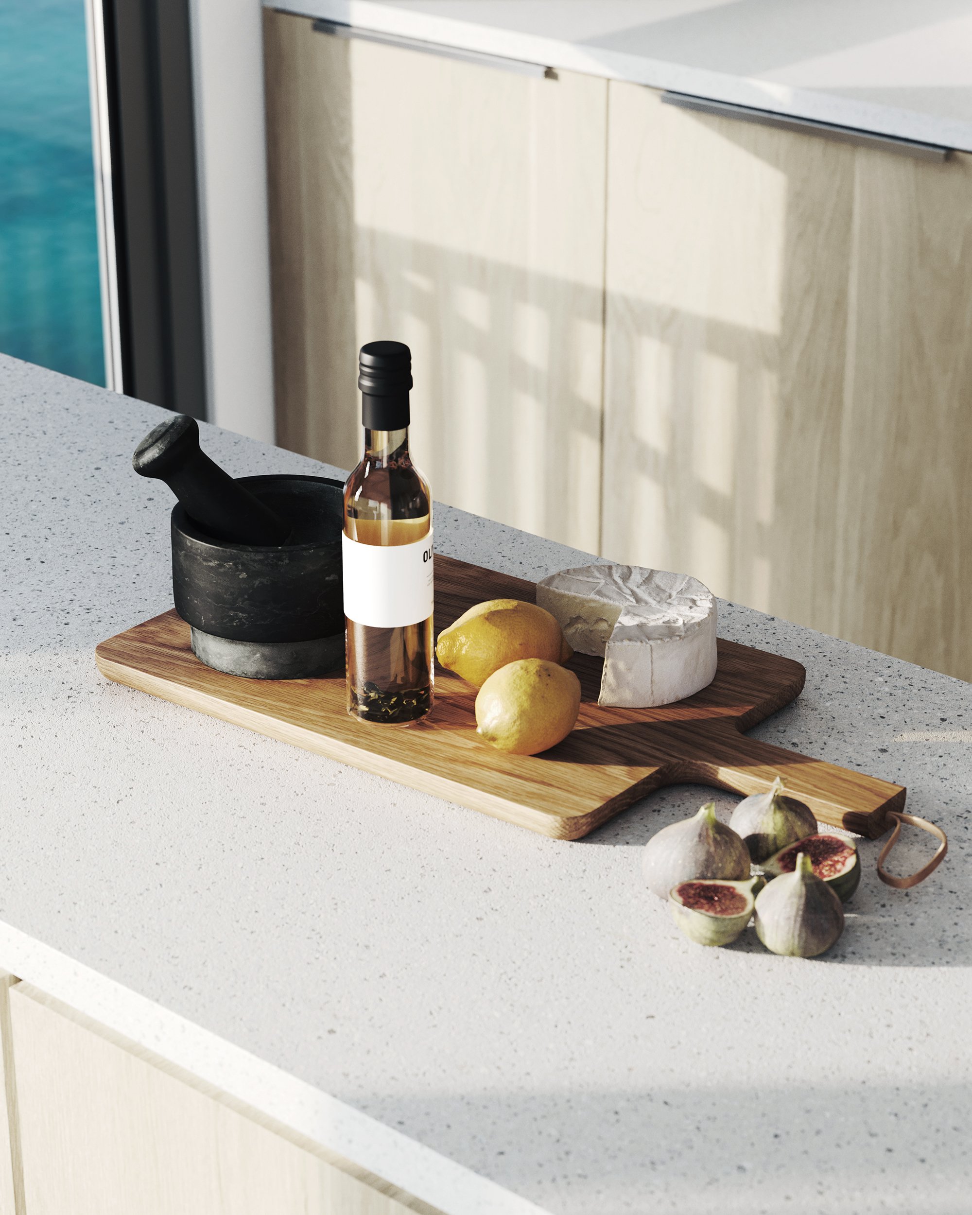 A kitchen counter with a wooden cutting board holding lemons, a wheel of brie cheese, and a bottle of oil. Next to the board are figs and a black mortar and pestle. emaar Eagle Hills. Maryam Island CGI. Dubai Real estate marketing.