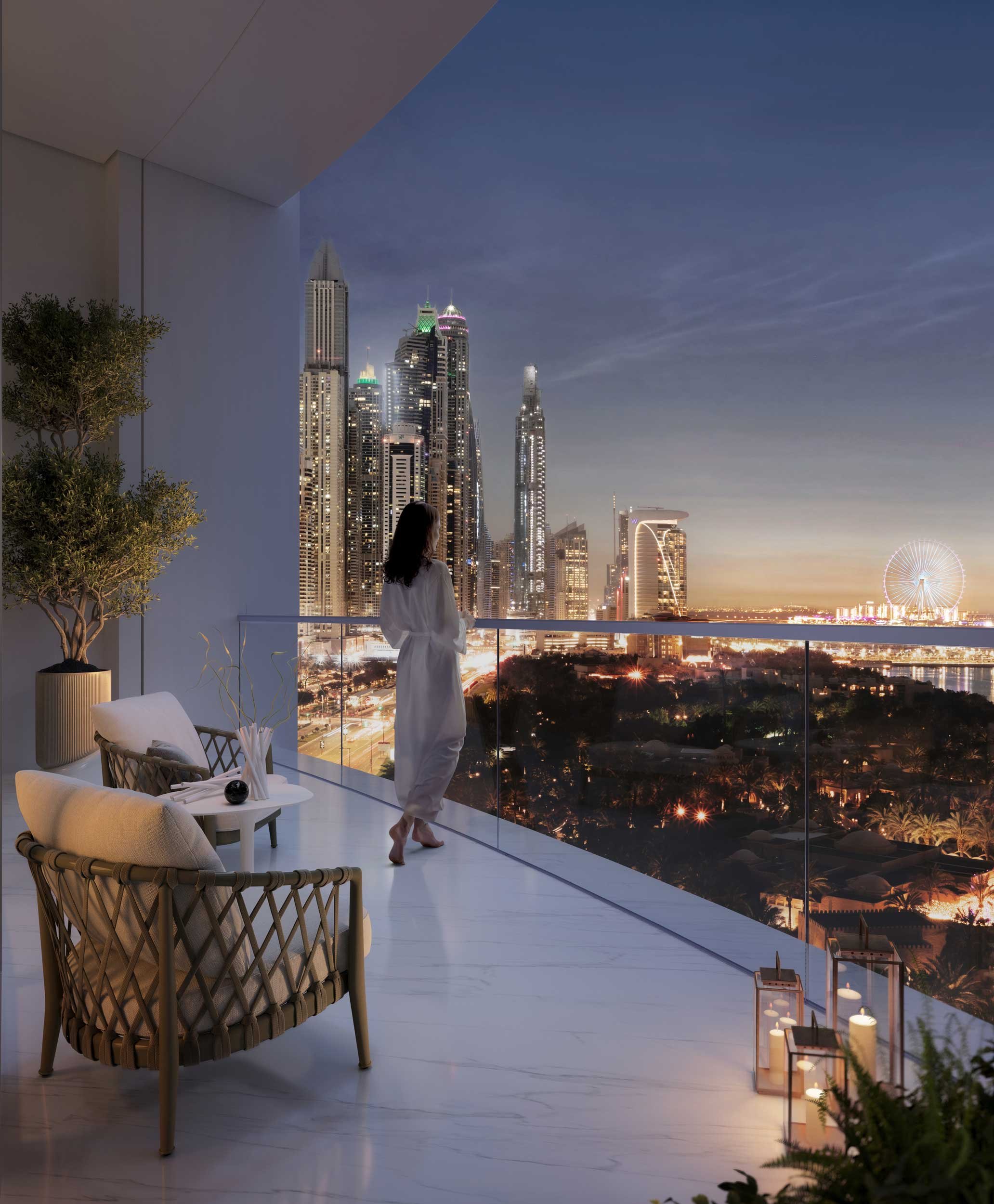 A woman in a white dress stands on a balcony, looking at a city skyline with tall buildings illuminated at dusk, with a Ferris wheel visible in the distance.