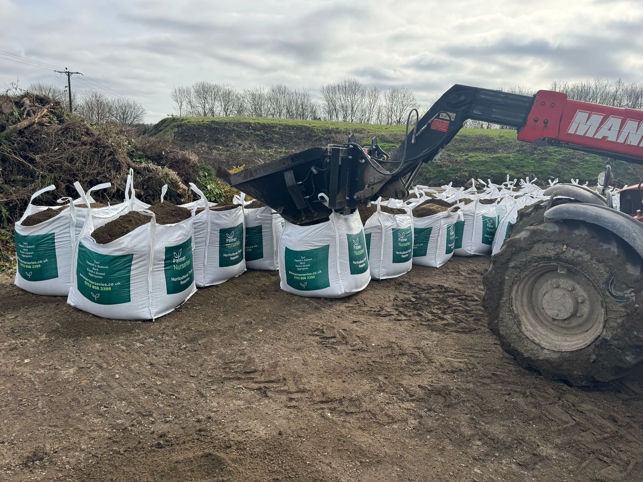 Contract Grade vs. Premium Topsoil