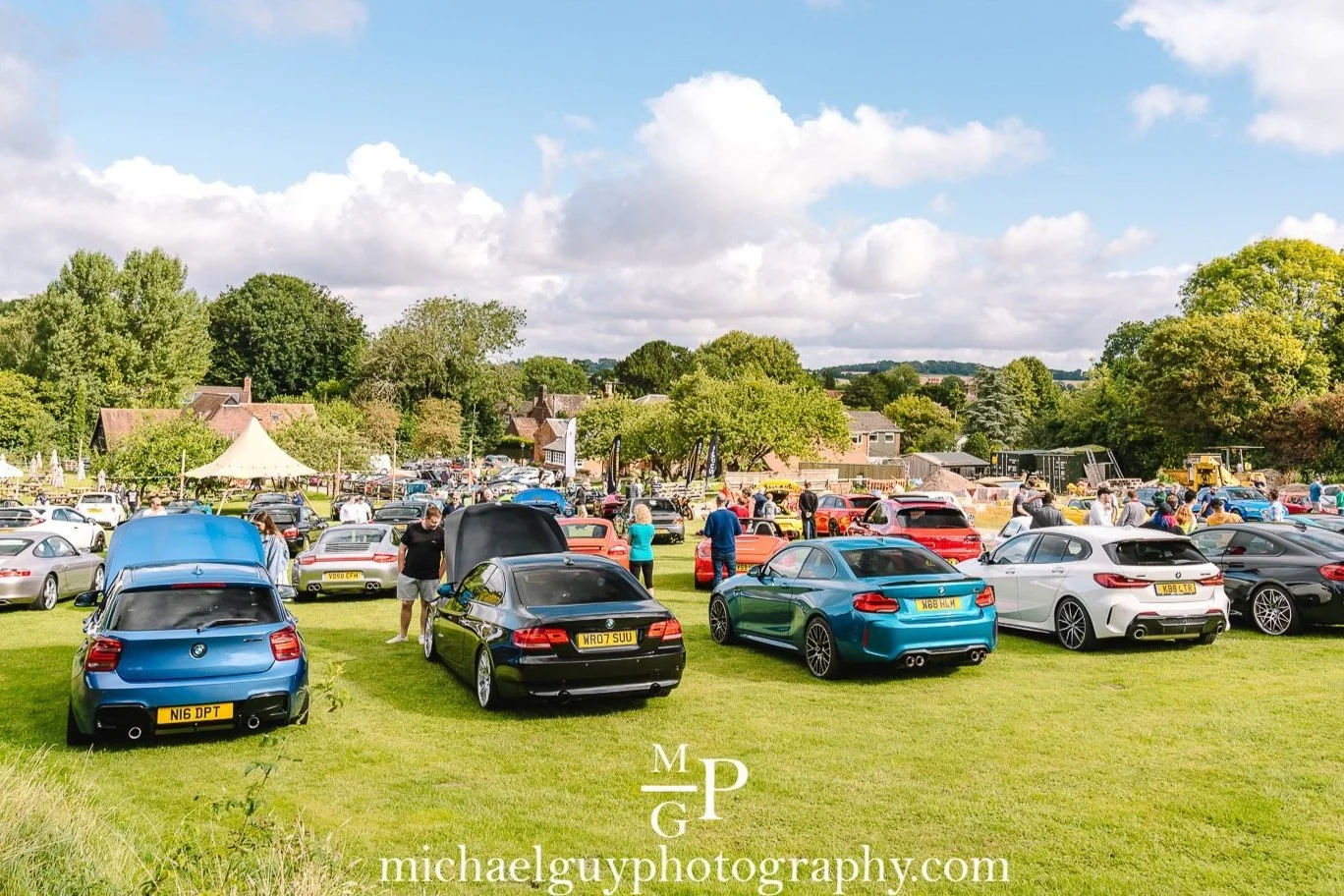Machines parked on the lawn at a Daily Driven Events show