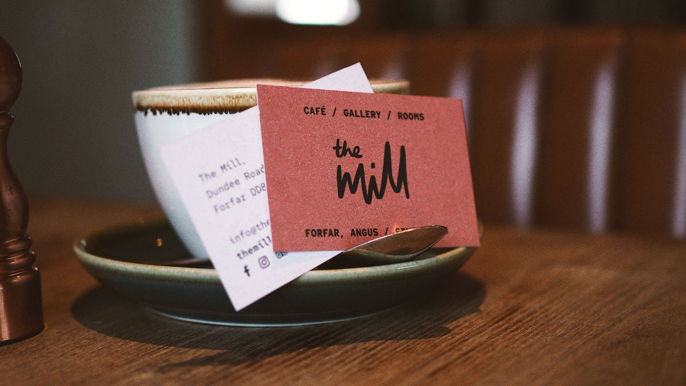 The Mill: Business Card on a Tea Cup