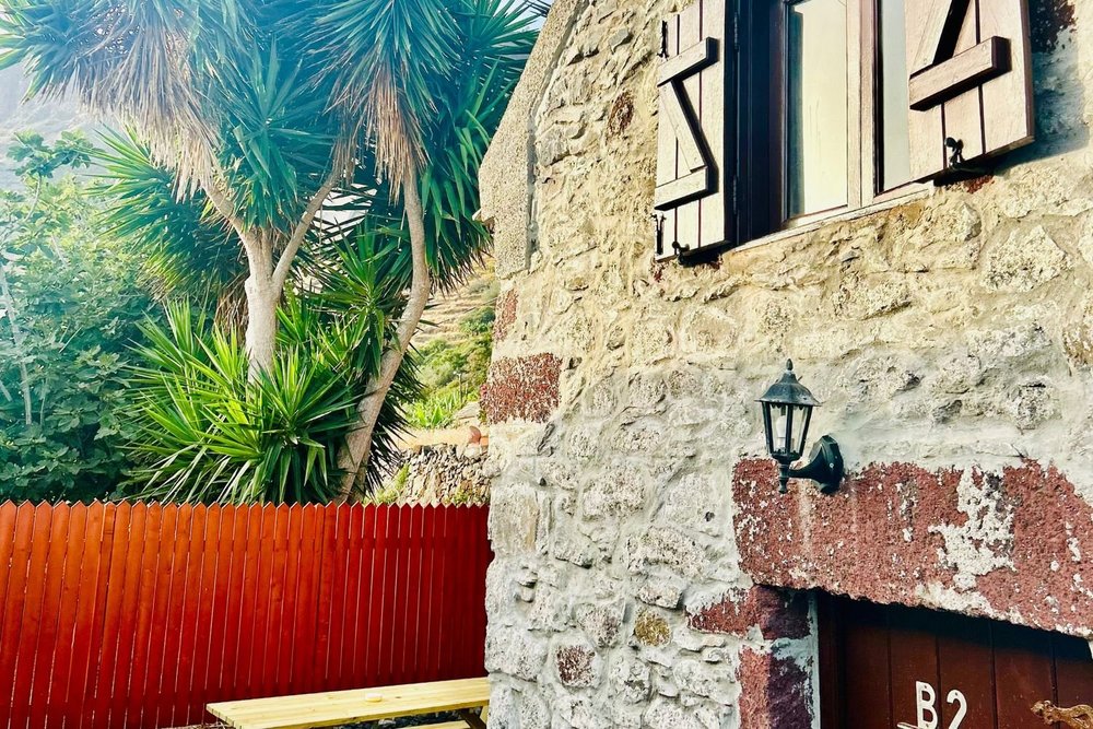 Palheiro Jardim stone cottage, Paúl do Mar