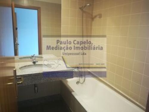 The second bathroom, the same bath and shower with a mirror above the granite top