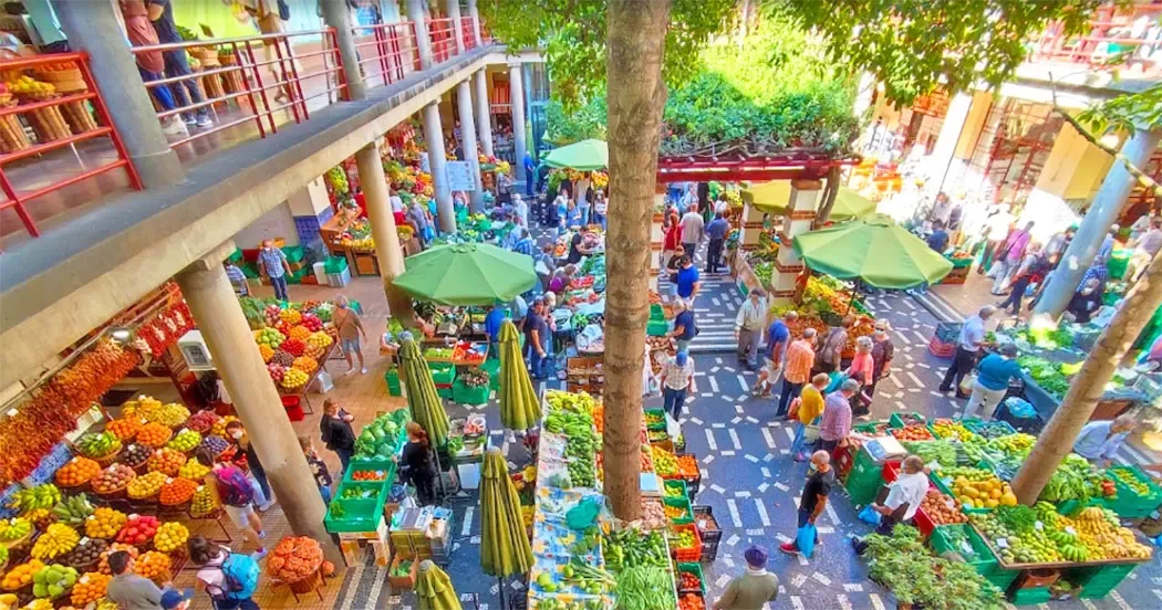 Fruit and flower stalls inside Mercado dos Lavradores in Funchal