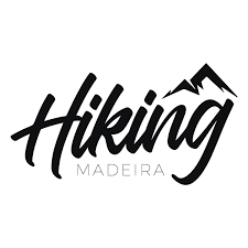 A guided walking group on a Madeira levada path